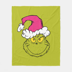 Couverture Polaire Grinch avec un chapeau de Père Noël rose