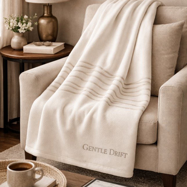 Couverture Polaire Ivory Taupe Drift Fleece Blanket (Soft taupe lines drift across ivory, grounding neutral spaces with gentle visual flow.)
