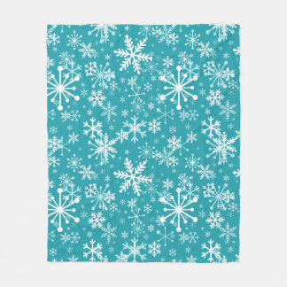 Couverture Polaire Les flocons de neige turquoises. Noël, vacances d'