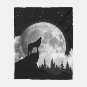 Couverture Polaire Loup noir et blanc hurlant sur la lune