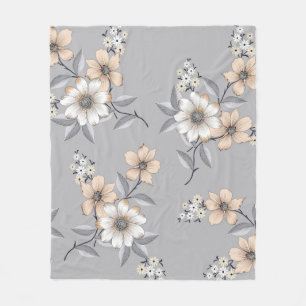 Couverture Polaire motif de fleurs grises et blanches sur fond gris