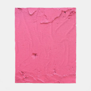 COUVERTURE POLAIRE MUR EN BÉTON ROSE PENDANT LA JOURNÉE