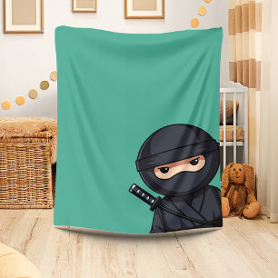 Couverture Polaire Ninja qui regarde discrètement sur fond vert
