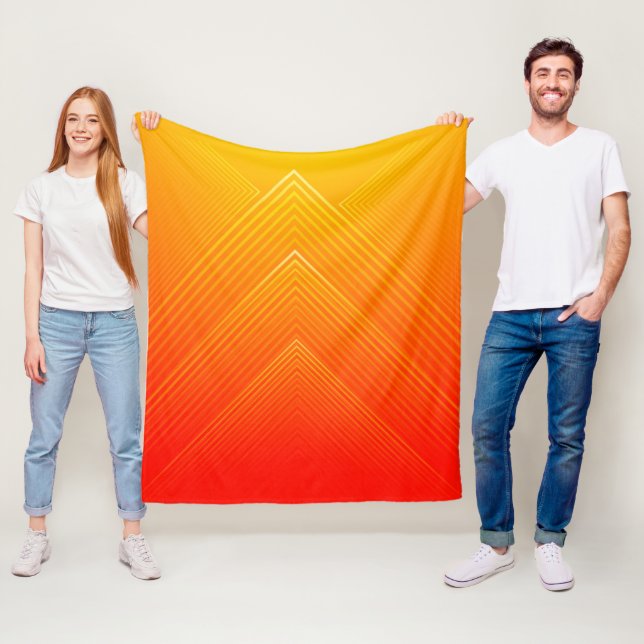 Couverture Polaire Ombre géométrique orange à jaune (En situation)