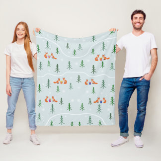 Couverture Polaire Renards de Noël en forêt enneigée avec cadeaux