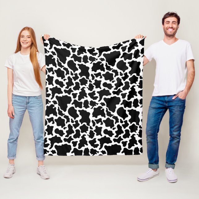 Couverture Polaire Vache blanche et noire (En situation)