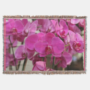 Couverture rose de jet d'orchidées