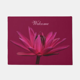 Couverture rose de tapis de porte de nénuphar de