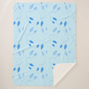 Couverture Sherpa à motif de feuilles bleues botan