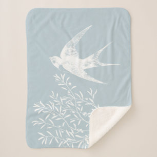 Couverture Sherpa Avaler l'oiseau survolant les branches d'olivier