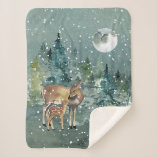 Couverture Sherpa Biche et faon dans une forêt enneigée sous la plei