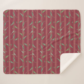 Couverture Sherpa Branche de feuilles sur papier peint rouge