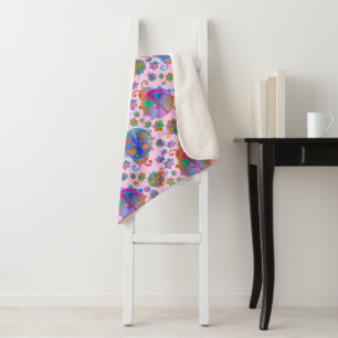 Couverture Sherpa Coccinelles parmi les fleurs sur un coucher de sol