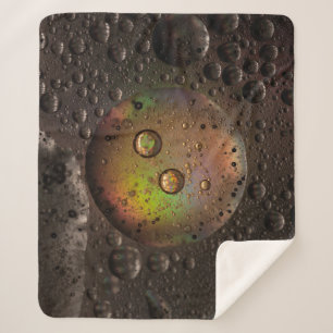 Couverture Sherpa gouttelettes d'eau sur panneau de verre