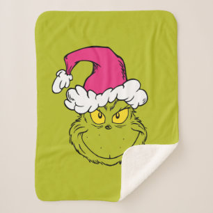 Couverture Sherpa Le Grinch avec un chapeau de Père Noël rose