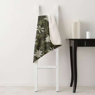 Couverture Sherpa Magnolia et feuilles verts sur noir