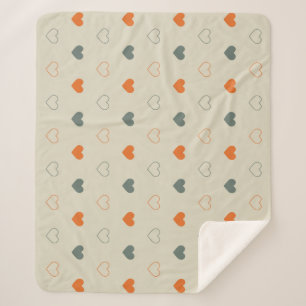 Couverture Sherpa Motif de grille de cœurs orange et vert