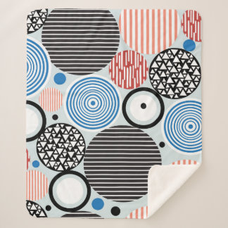 Couverture Sherpa motif graphique de cercles multicolores différents