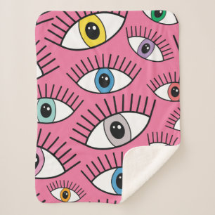 Couverture Sherpa Motif magique aux yeux colorés. Contexte mystique