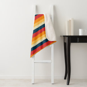 Couverture Sherpa rayures rouges, bleues, orange et jaunes