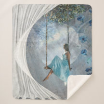 Une femme en robe bleue sur un swing
