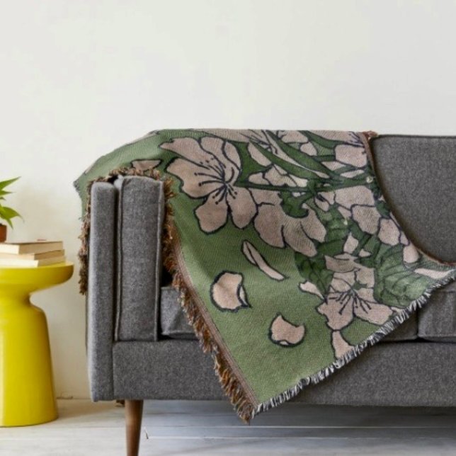 Couverture Vert Fleur de Cerisier   (A warm throw blanket with an elegant floral design. )