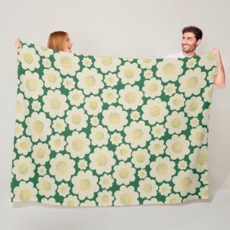 Couverture verte aux fleurs blanches