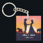 Cowboy and Cowgirl Wedding in Silhouette Keychain<br><div class="desc">A cowboy and his bride are silhouetted against a beautiful setting sun.</div>