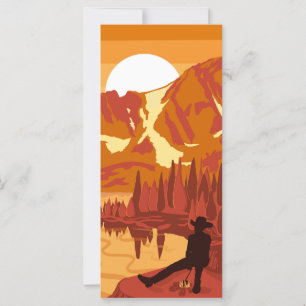 Cowboy at sunset in the mountains