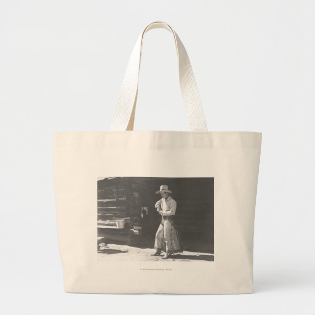 Cowboy eating from a Peter Pan peanutbutter can. Large Tote Bag (Front)