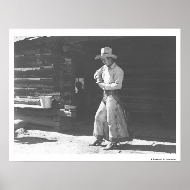 Cowboy eating from a Peter Pan peanutbutter can. Poster (Front)