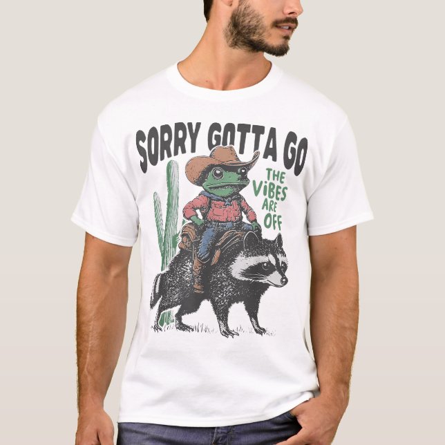 Cowboy Frog Riding Raccoon The Vibes Are Off Weird T-Shirt (Front)