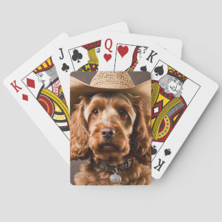 Cowboy hat wearing cockapoo playing cards