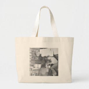 Cowboy making coffee inside the bunkhouse large tote bag