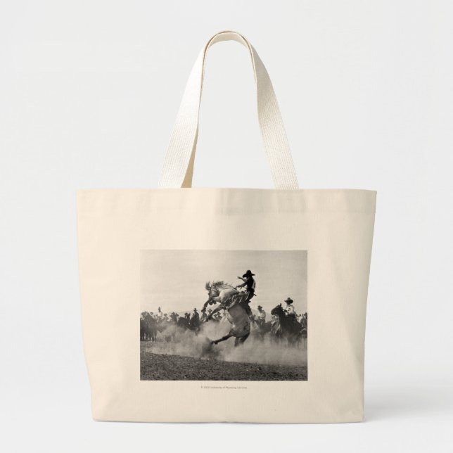 Cowboy on a bucking bronco large tote bag (Front)