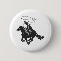 Cowboy on bucking horse running with lasso