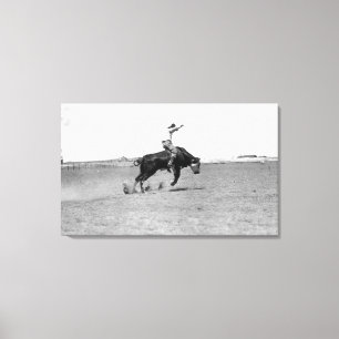 Cowboy Riding a Bucking Bull Canvas Print