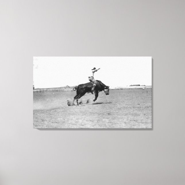 Cowboy Riding a Bucking Bull Canvas Print (Front)