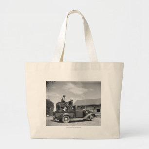 Cowboy with horse in a truck large tote bag