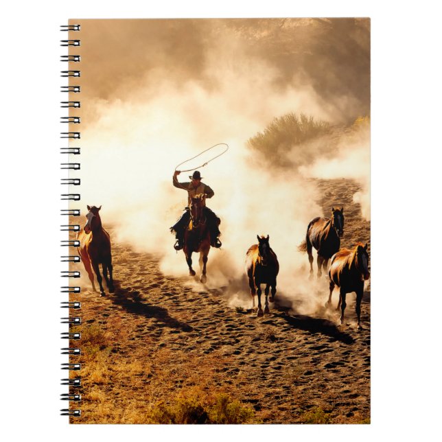 Cowboys chasing wilding horses. roping and riding, notebook (Front)