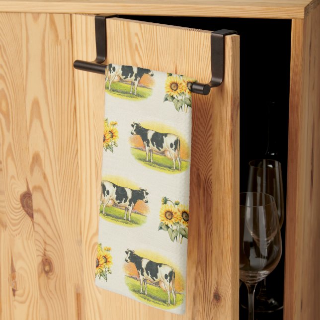 Cows and sunflowers on folded linen texture kitchen towel (Thirds Fold)