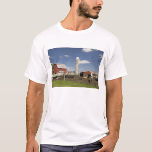 Cows in front of a red barn and silo on a farm T-Shirt