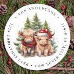 Cozy Highland Cow Farm Christmas Return Address Classic Round Sticker<br><div class="desc">Looking for the cutest Christmas cards of the season! Our Highland Cow duo featuring two holiday calves are sure to bring a smile to your loved ones' faces. The design is adorable with the calves wearing a Santa hat and a plaid winter scarf, surrounded by trees and a cozy winter...</div>