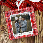 Cozy Red and White Plaid fabric Family Photo Metal Ornament<br><div class="desc">Red & white plaid fabric 2 photo family ornament. The design features a faux red and white plaid fabric texture design with hints of light pink. Personalize with two special photos,  one on each side,  and customize with your last name and year. Designed by Moodthology Papery</div>