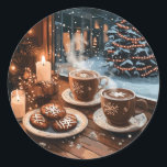 Cozy Winter Cafe with Hot Cocoa and Cookies Classic Round Sticker<br><div class="desc">Experience the warmth of the holidays with a cozy winter illustration featuring steaming hot cocoa in snowflake mugs,  festive cookies,  and glowing candles on a wooden table by the window. Outside,  snow falls gently,  framing a beautifully lit Christmas tree and a charming snowy street.</div>