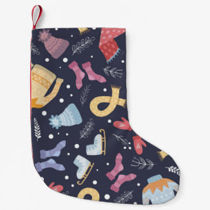 Cozy winter things on a blue background. Knitted c Small Christmas Stocking