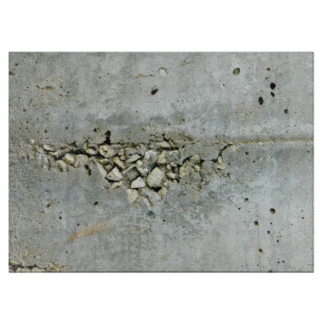 Cracked concrete wall with small stones cutting board (Front)