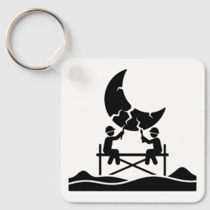 Cracked moon repair workers on scaffold fixing sky keychain