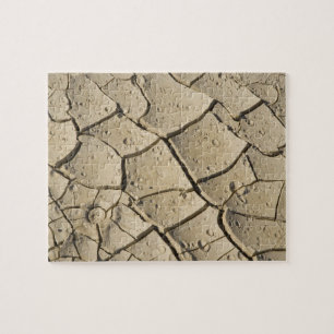 Cracked Mud formation in the Valley floor of 2 Jigsaw Puzzle