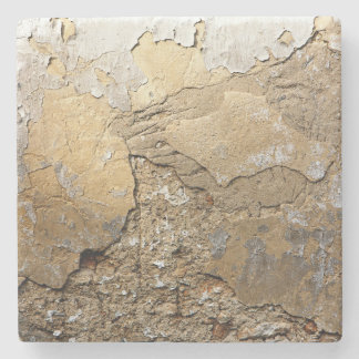 Cracked plastered wall. stone coaster